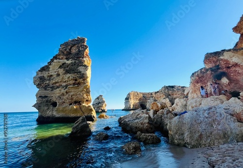 Oddly shaped jagged rock formations and cliffs at Lagoa Beach, Faro District, Southern Portugal.