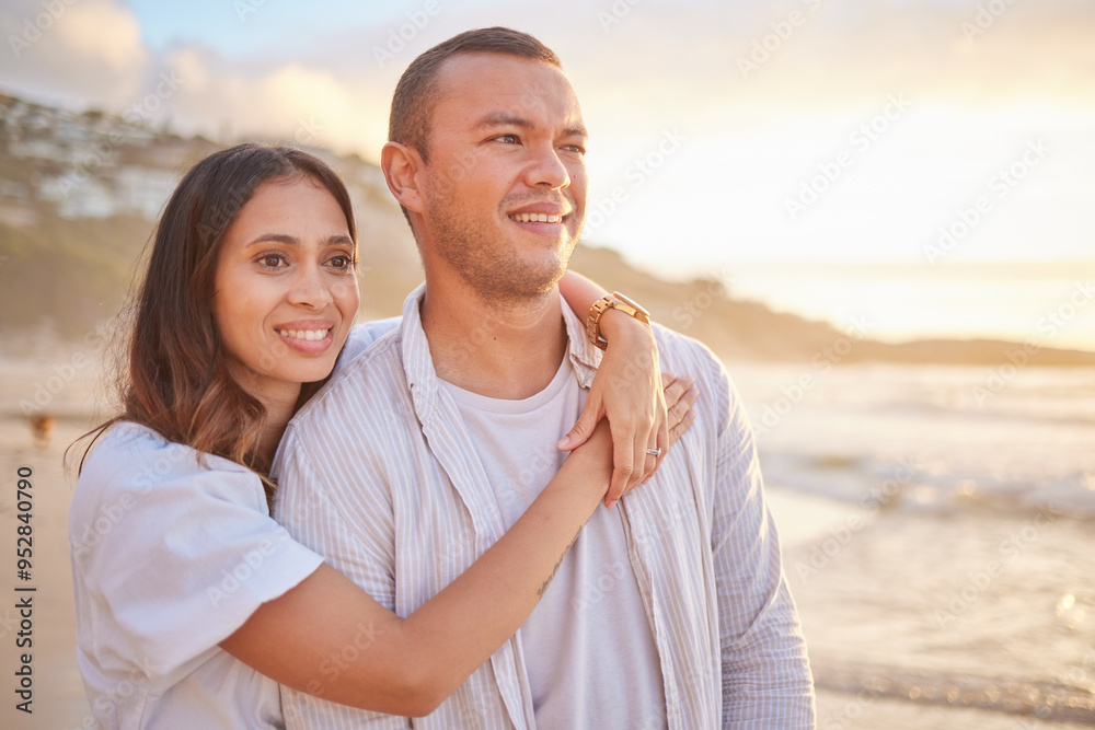 Fototapeta premium Happy, couple and hug on beach with love, bonding and romance date for tropical travel in Greece. Smile, woman and man with embrace of relationship, commitment and loyalty for ocean sunset outdoor
