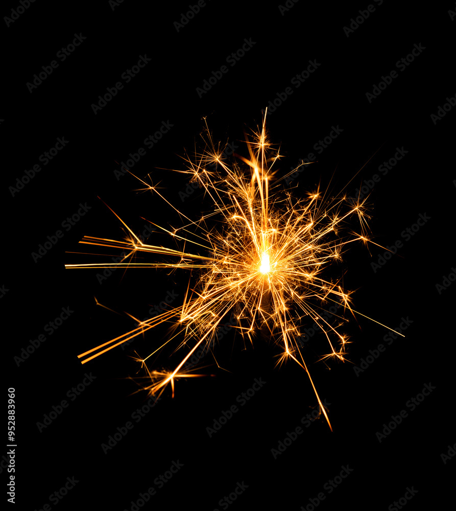 Christmas sparkler burning isolated on black background... Christmas sparkler burning isolated on black background...