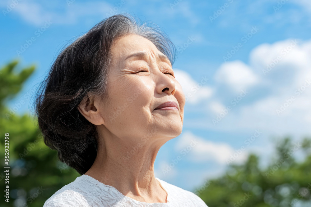 custom made wallpaper toronto digitalKorean senior woman taking a breath on a sunny day, mental health