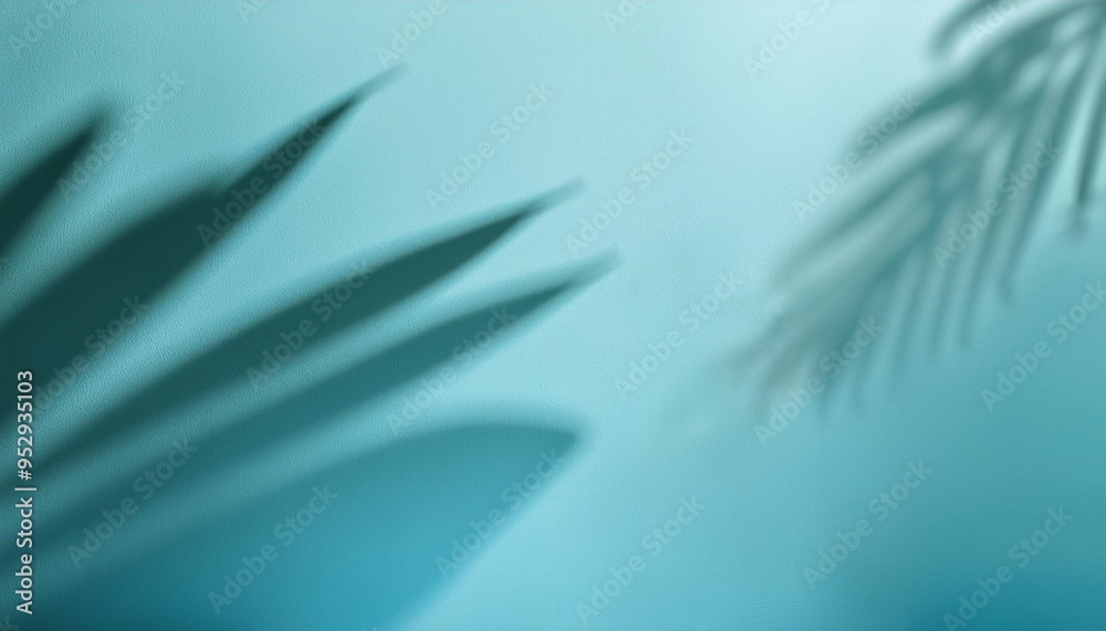 blurred shadow from palm leaves on the light blue wall minimal abstract background for product presentation spring and summer blurred shadow from palm leaves on the light blue wall minimal abstract background for product presentation spring and summer