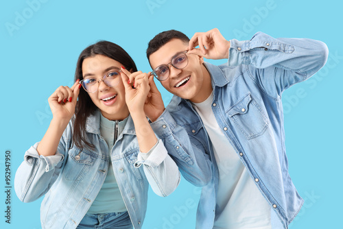 Young couple in eyeglasses ...