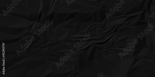Texture of dark black crumpled wrinkle chaotic paper. old crumple black paper sheet abstract shape background space for text.