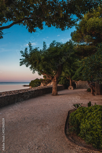 Krk Croatia 28.06.24A small square near the walls of the old fortress photo