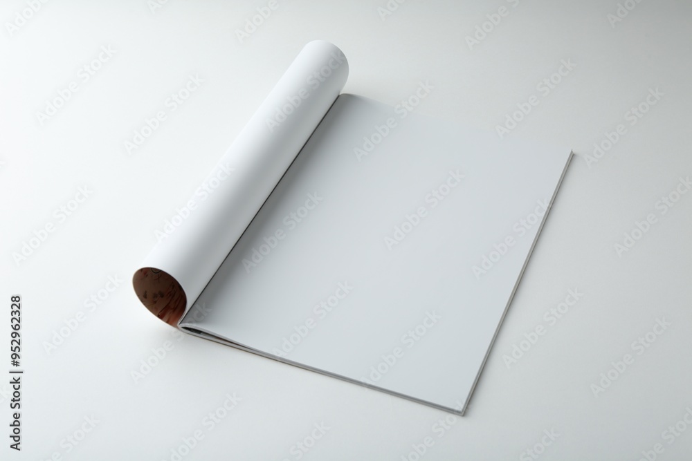 Open magazine with blank page on white background. Mockup for design Open magazine with blank page on white background. Mockup for design