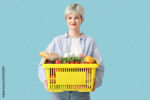 Young woman with full shopp...