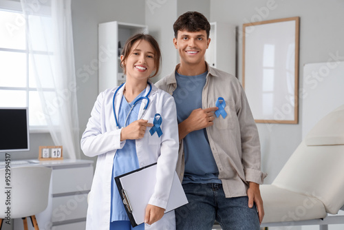 Young man and female doctor...