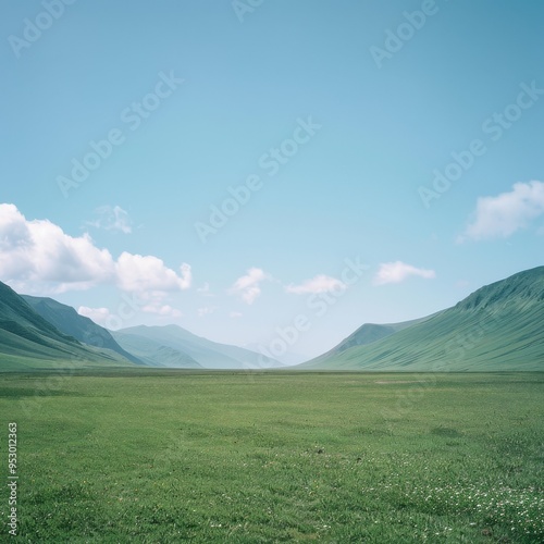 cloudless,highest mountain on the left,green lawn on the left,endless green mountains background,no waterblue sky and white cloud,real photo  photo