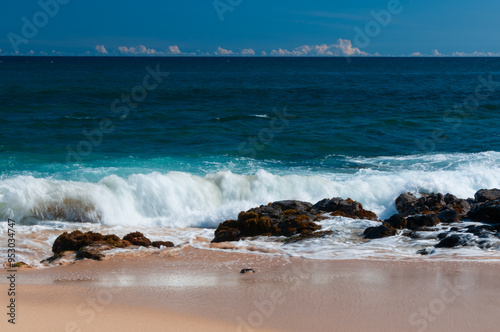 Waves on a beach in Poipu Kauai Hawaii during the Day