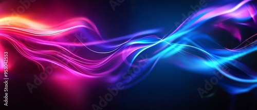 Vibrant abstract light trails in purple, pink, and blue hues creating a dynamic, colorful wave pattern on a dark background.