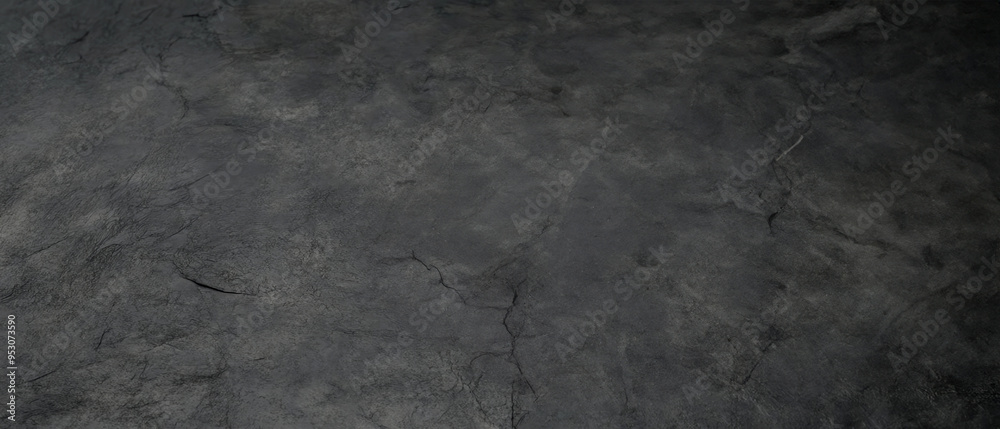 Close-up of a dark, textured stone surface with visible cracks and natural imperfections, ideal for backgrounds or design use. Close-up of a dark, textured stone surface with visible cracks and natural imperfections, ideal for backgrounds or design use.