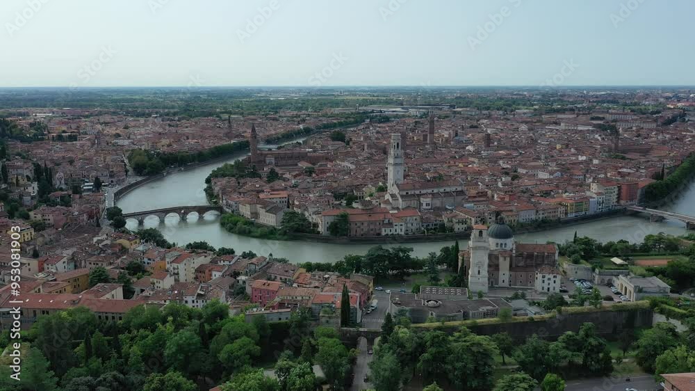 Aerial view of Verona city tourist center, Adigio river, bridges and Cattedrale di Santa Maria Matricolare on a sunny summer day, Italy, Europe Aerial view of Verona city tourist center, Adigio river, bridges and Cattedrale di Santa Maria Matricolare on a sunny summer day, Italy, Europe