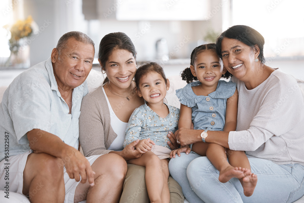 Love, portrait and smile with family on sofa in living room of home together for bonding or visit. Happy, hug or relax with senior grandparents, mother and sibling children in apartment on weekend Love, portrait and smile with family on sofa in living room of home together for bonding or visit. Happy, hug or relax with senior grandparents, mother and sibling children in apartment on weekend