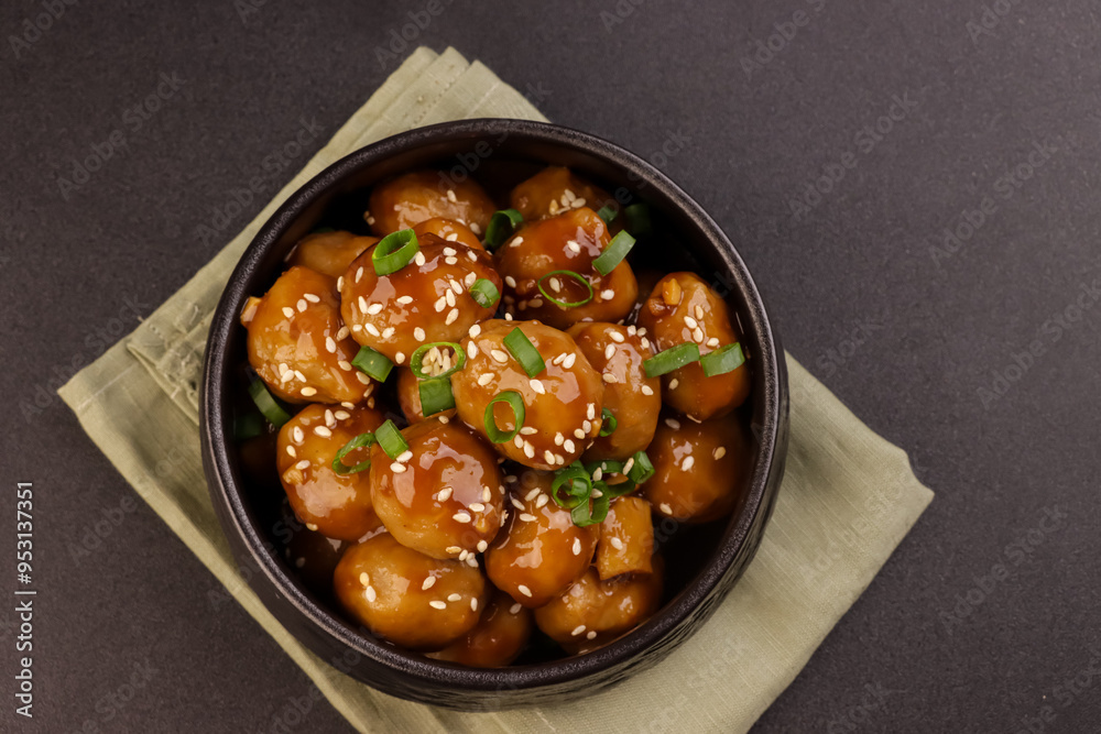 Meatballs Teriyaki with Sesame Seeds in a Bowl.