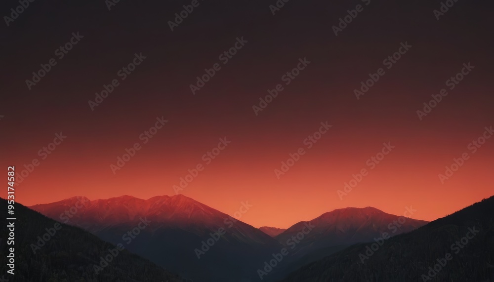 A fiery sunset over a mountain range creates a dramatic, vibrant scene. A fiery sunset over a mountain range creates a dramatic, vibrant scene.
