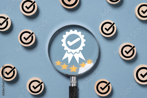 Best quality assurance and golden five stars inside of magnifier glass with correct sign mark  for focus guarantee product and ISO service concept.