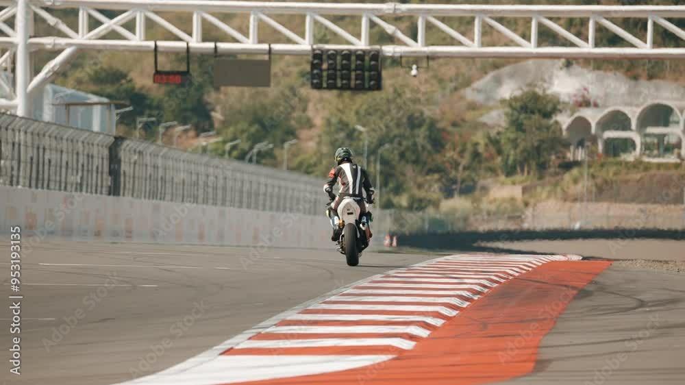 Motorcyclist rides on a race track. Motorcycle racer training. Motorcyclist rides on a race track. Motorcycle racer training.