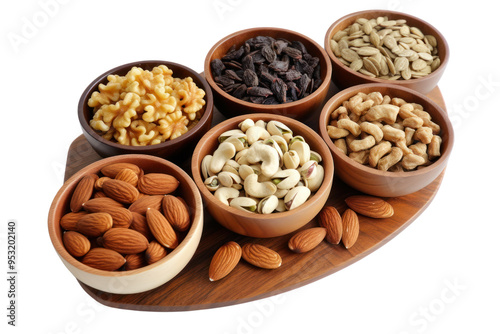 A collection of nuts and seeds including almonds, walnuts, chia seeds, isolated on white background