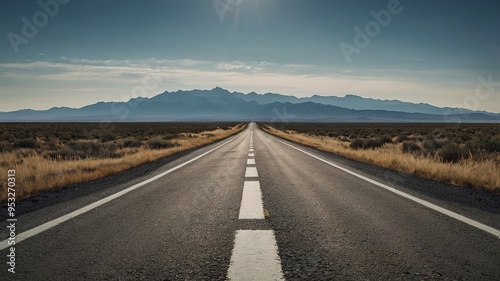 Straight road disappearing into the horizon, lane divider in the middle