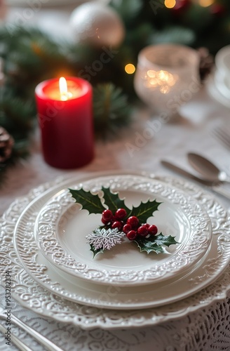 A beautifully set Christmas table with elegant plates and festive decorations photo