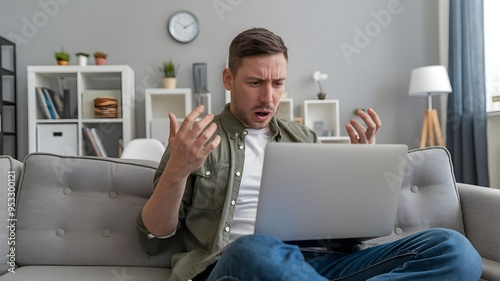 Frustrated Man Reacting to Laptop Problems in Modern Home Office