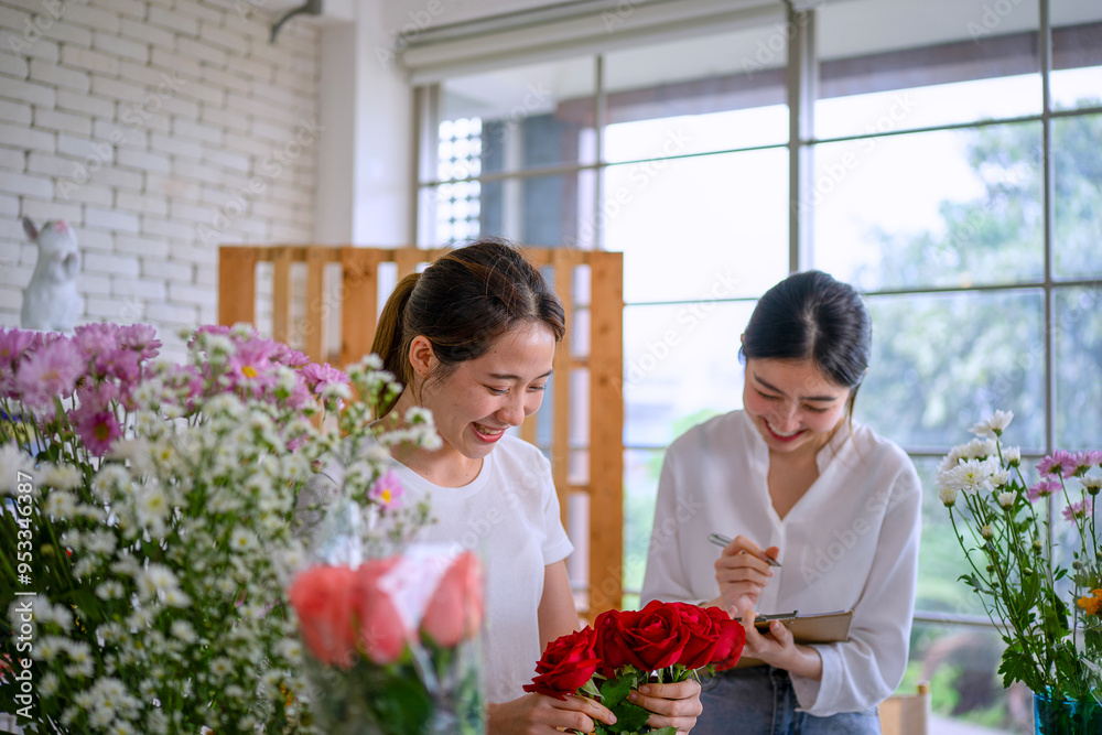 Young entrepreneurs are working at florist shop. Young entrepreneurs are working at florist shop.