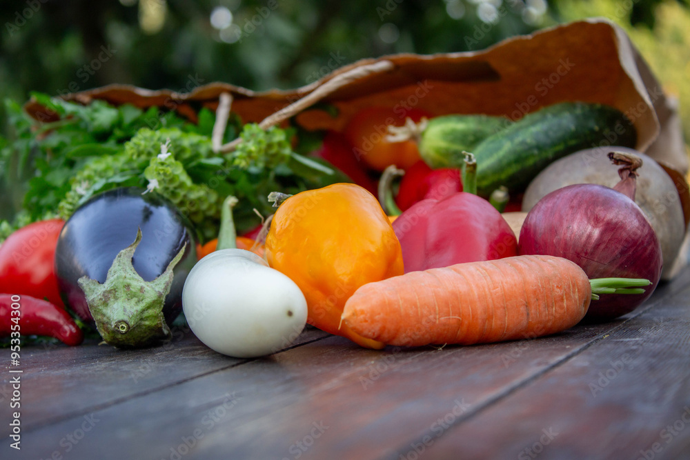 fresh vegetables on a wooden background in a paper bag. Selective focus fresh vegetables on a wooden background in a paper bag. Selective focus