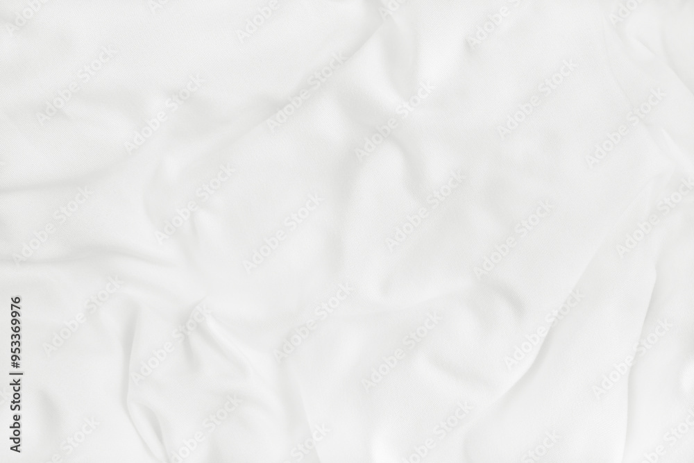 Texture of white blanket and bedding sheet with crumpled or messy in bedroom after wake up. Texture of white blanket and bedding sheet with crumpled or messy in bedroom after wake up.
