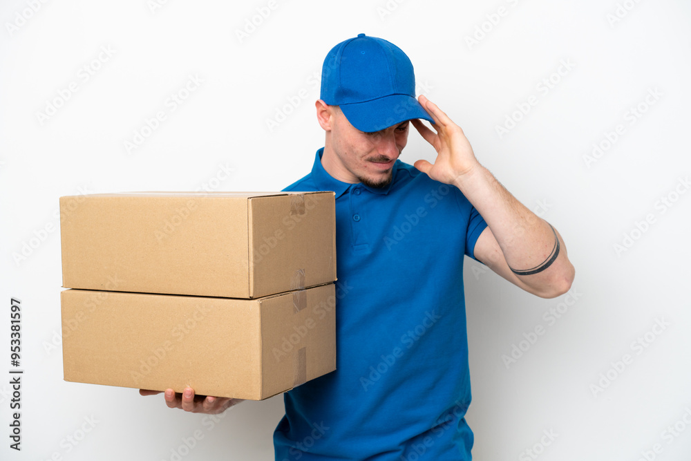 Delivery caucasian man isolated on white background with headache Delivery caucasian man isolated on white background with headache