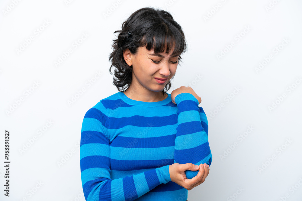 Young Argentinian woman isolated on white background with pain in elbow Young Argentinian woman isolated on white background with pain in elbow