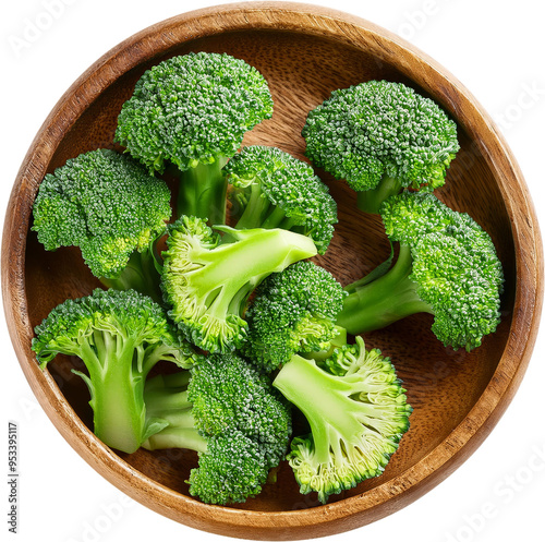 Fresh green broccoli arranged neatly in a wooden bowl, showcasing its vibrant color and healthy appeal for culinary inspiration. photo