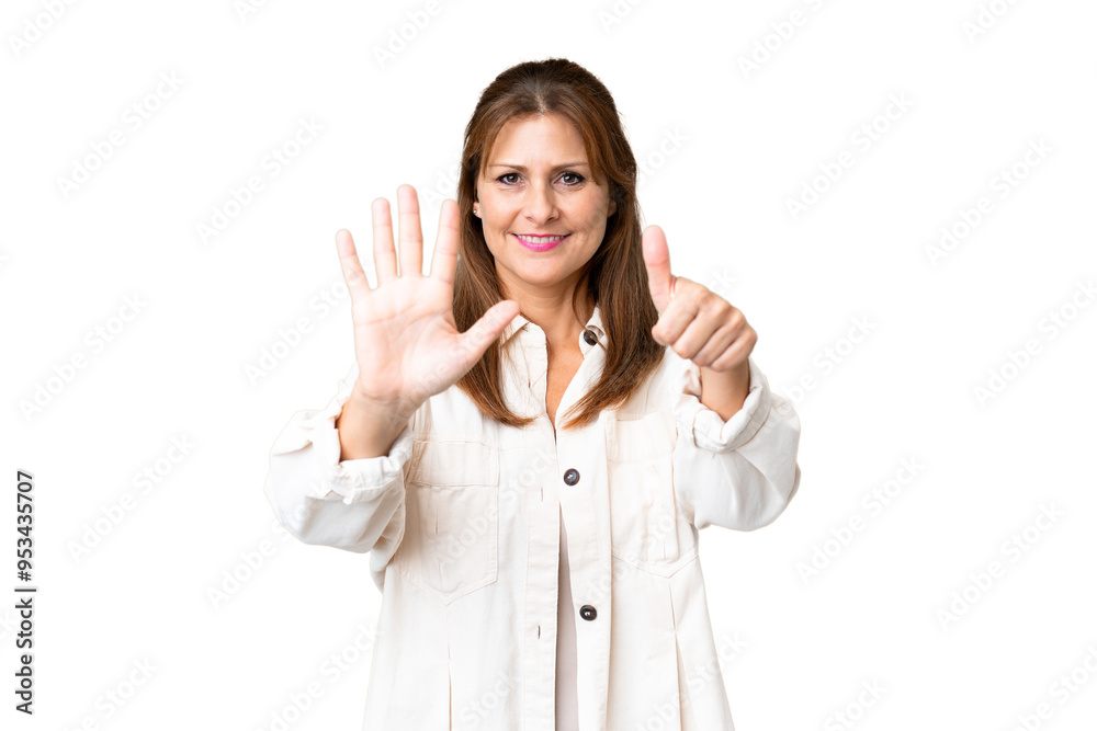 Middle age woman over isolated background counting six with fingers Middle age woman over isolated background counting six with fingers