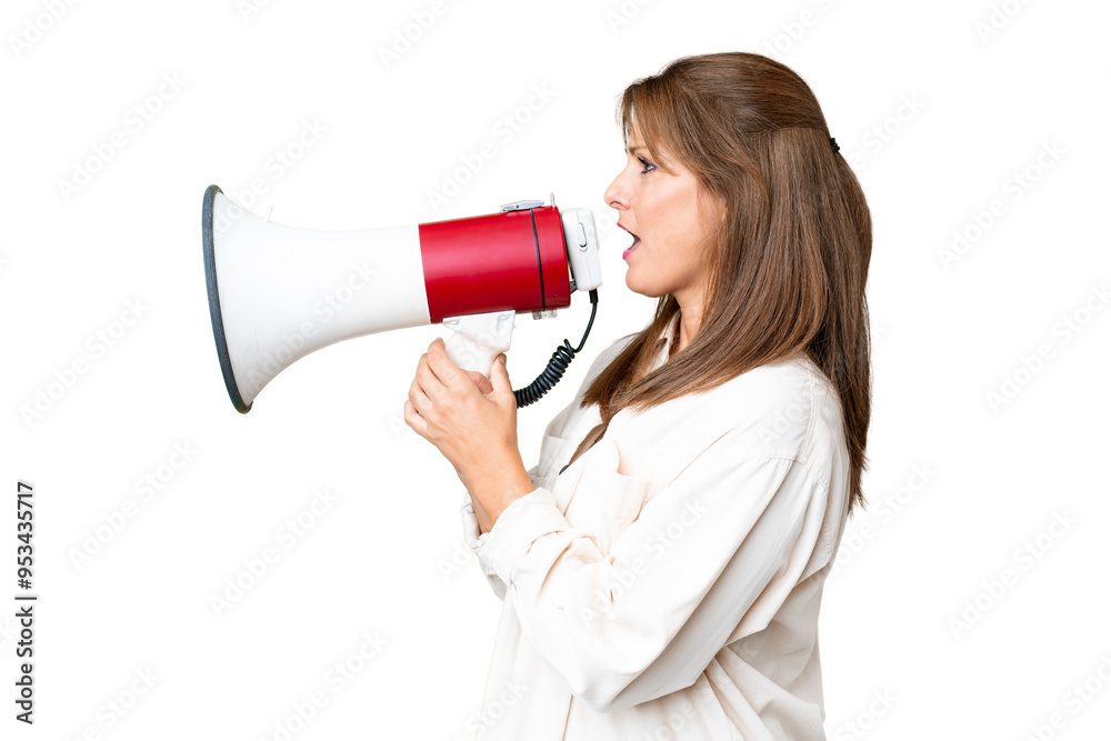 Middle age woman over isolated background shouting through a megaphone Middle age woman over isolated background shouting through a megaphone