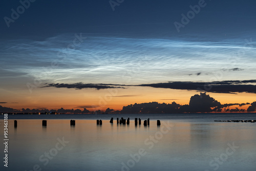 Summer sunrise with noctilucent clouds photo