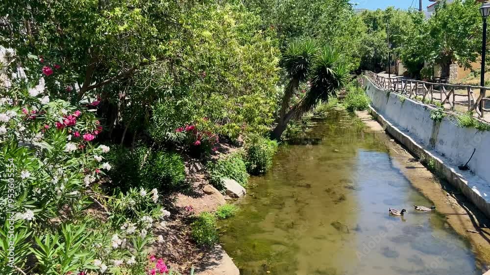 A beautiful canal in a small Southern European town A beautiful canal in a small Southern European town