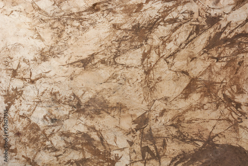 soiled dirty or muddy white cotton fabric background texture, abstract of stained and discolored cloth with brown streaks or blotches of mud and dirt wallpaper backdrop