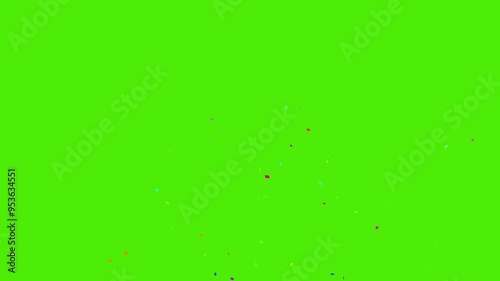 Confetti Particles. Gold festive confetti explosions fall on a green background. 4K Footage Video