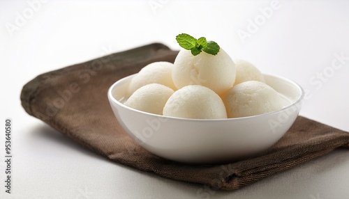 Indian famous sweet food rasgulla on white background photo