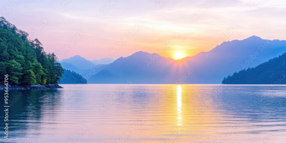 Fototapeta premium beautiful sunset over lake and mountains on background