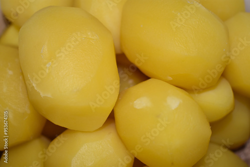 Boiled potatoes close-up. Background of peeled boiled potatoes.