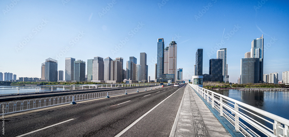 Obraz premium Modern City Skyline with Wide Road
