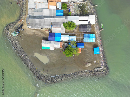 Aerial view of Pondok Bali Beach, West Java, seashore view and houses of local residents photo