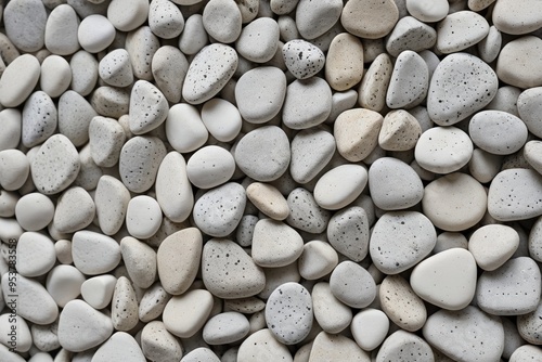 a close up of a pile of white rocks with black dots                          photo