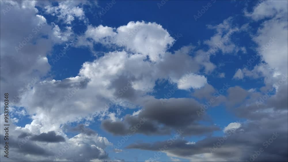 Beautiful sky landscape with white, gray and dark cumulus clouds Beautiful sky landscape with white, gray and dark cumulus clouds