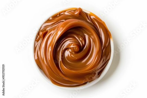 Sweet caramel sauce on white background top view.