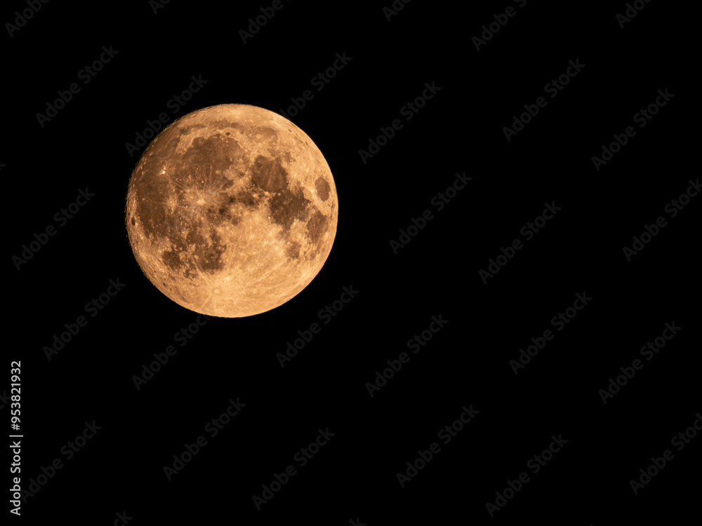 Fototapeta premium Red Dust Moon over the UK with dark night sky background