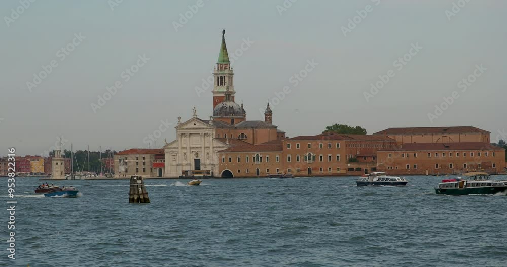 Boats navigating the serene waters near historic buildings in Venice during a tranquil afternoon Boats navigating the serene waters near historic buildings in Venice during a tranquil afternoon