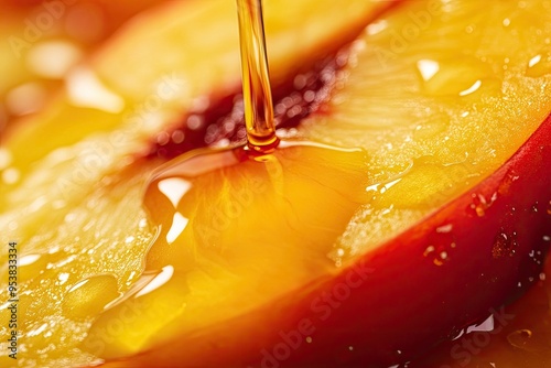Close-up of a juicy red peach slice with golden syrup dripping, highlighting fresh fruit and sweet flavors ideal for summer dishes.