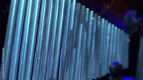 A man playing an instrument on stage