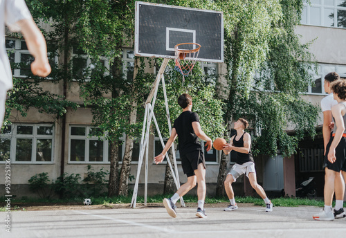 Friends gather for a casual basketball game on an aged community court, showcasing teamwork, energy, and friendship in their neighborhood setting.